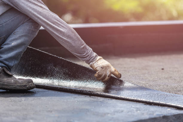 Professional Exterior Waterproofing technician working in Winchester, TN